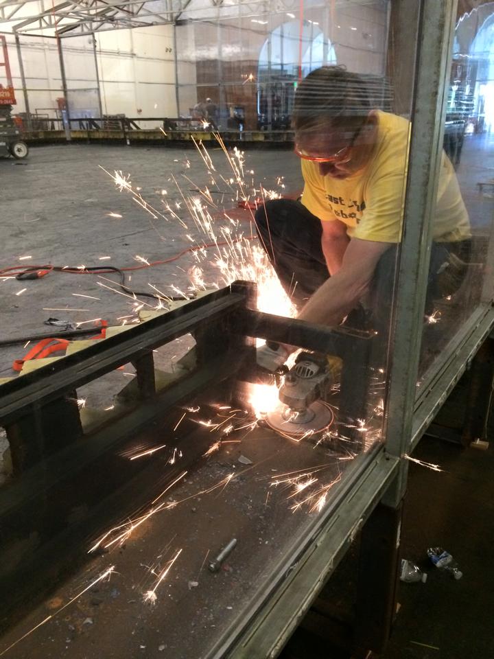 Mike cutting a broken bolt from the bumpers